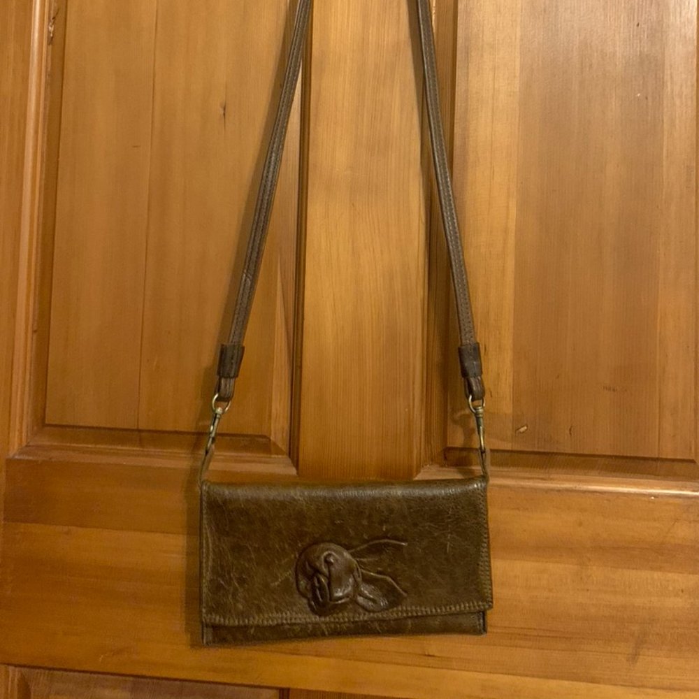 Hand sown Leather crossbody bag.